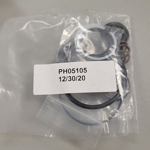 Pack of diverse mechanical O-rings and seals in a clear plastic bag, with part number 'PH05105' and a date labeled '12/30/20'