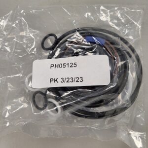 A variety of mechanical O-rings and seals in a transparent plastic bag, tagged with part number 'PH05125' and a packing date of '3/23/23'.